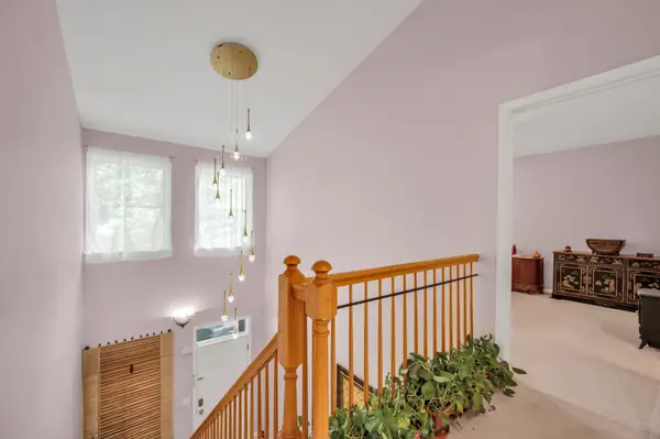 Vaulted landing overlooking the main level
